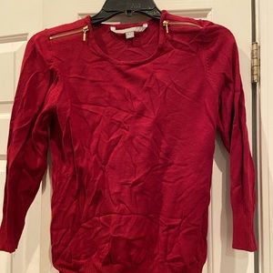 Red long-sleeve shirt